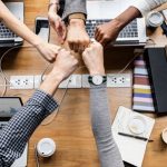 colleagues-giving-fist-bump_53876-64857-1.jpg